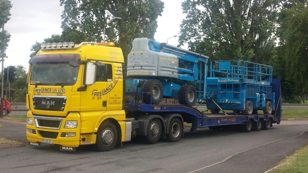 Hauling Genie Boom lift