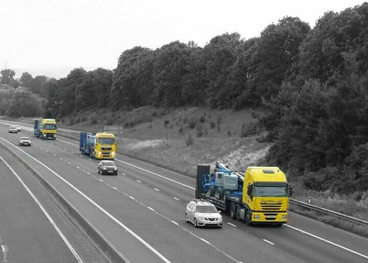 Three freelance trucks delivering access equipment