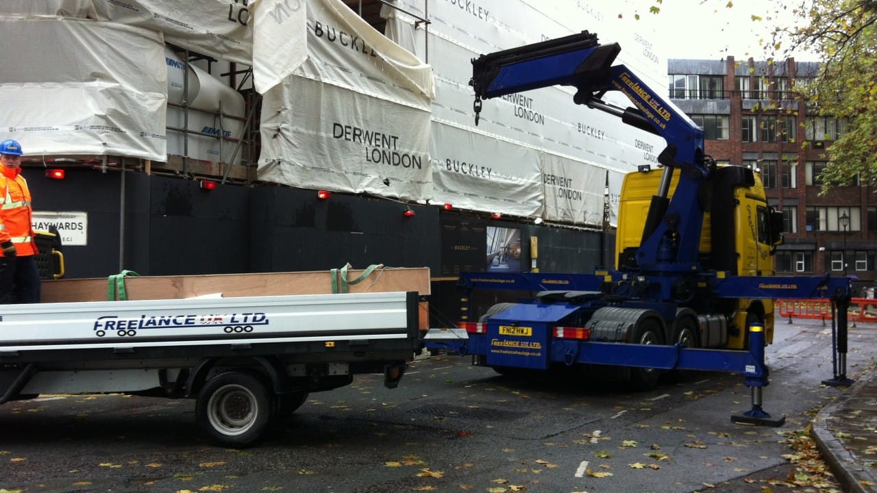 Lorry loader with trailer