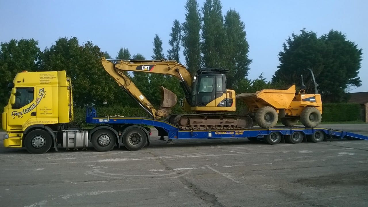 Delivering CAT digger